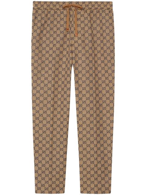 pantaloni gucci uomo con logo|Nuova collezione di pantaloni sportivi Gucci uomo su FARFETCH.